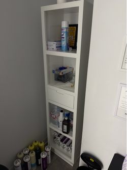 Spinning cabinet with drawer and mirror