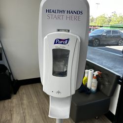 Hand sanitizer dispenser 