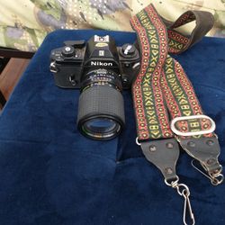 Nikon Camera (Camera Strap Included)(Doesn't Have Rolls)