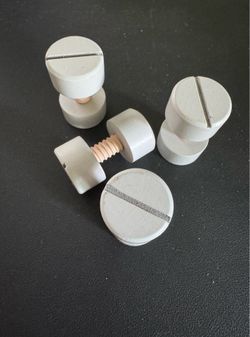 4 wooden screw in nuts. 2” Tall X 1” Wide Brand new. Great condition