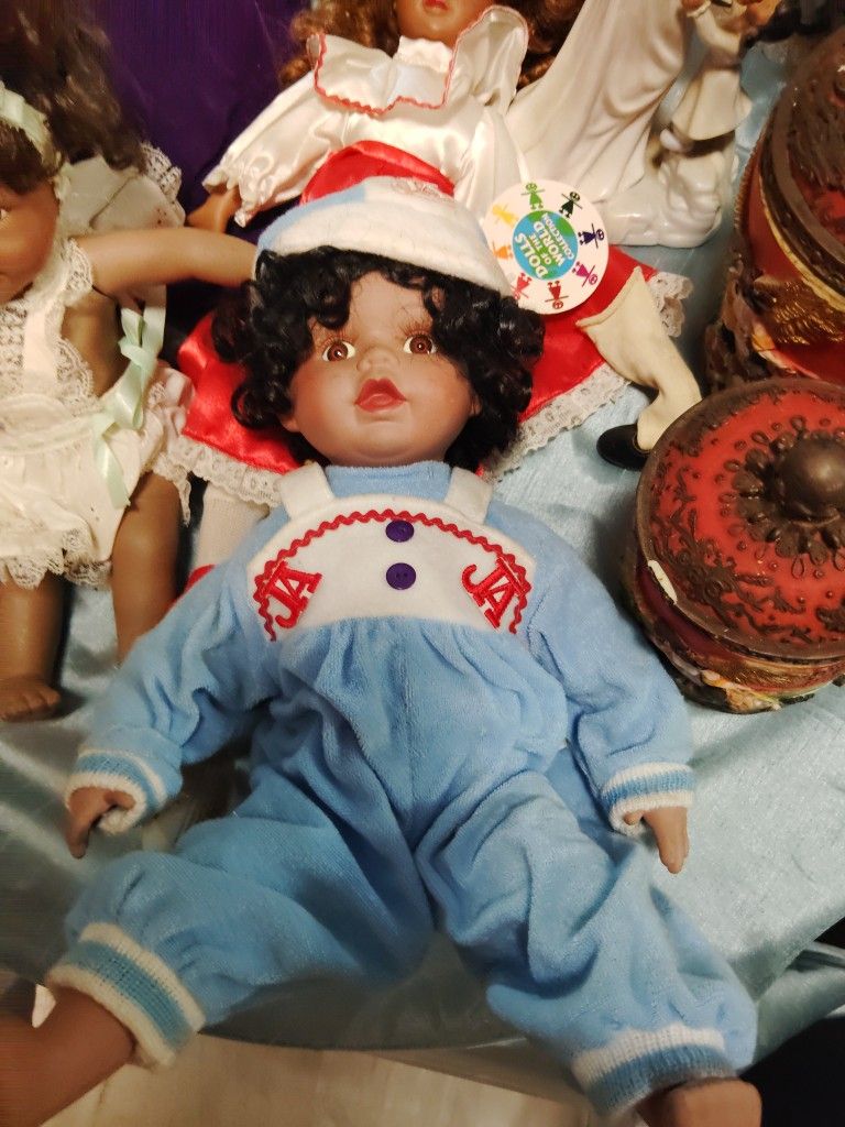 Beautiful porcelain collector doll in great condition. $70.