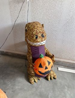 Halloween Inflatable T-Rex with Pumpkin