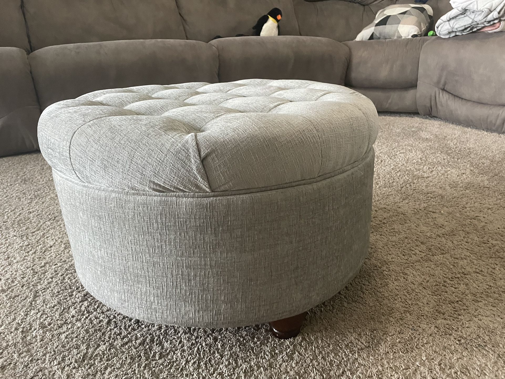 Grey Cushioned Storage Ottoman