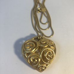 Anne Klein gold toned reversible puffy heart pendant