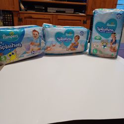 New Baby Pampers swim diapers splashers. S, M, L. Have multiple packages. New in package.