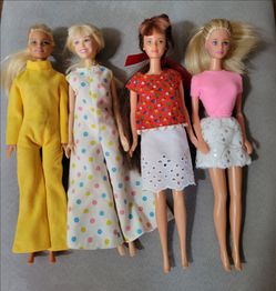 Lot of 4 Barbie Fashion Dolls with Outfits