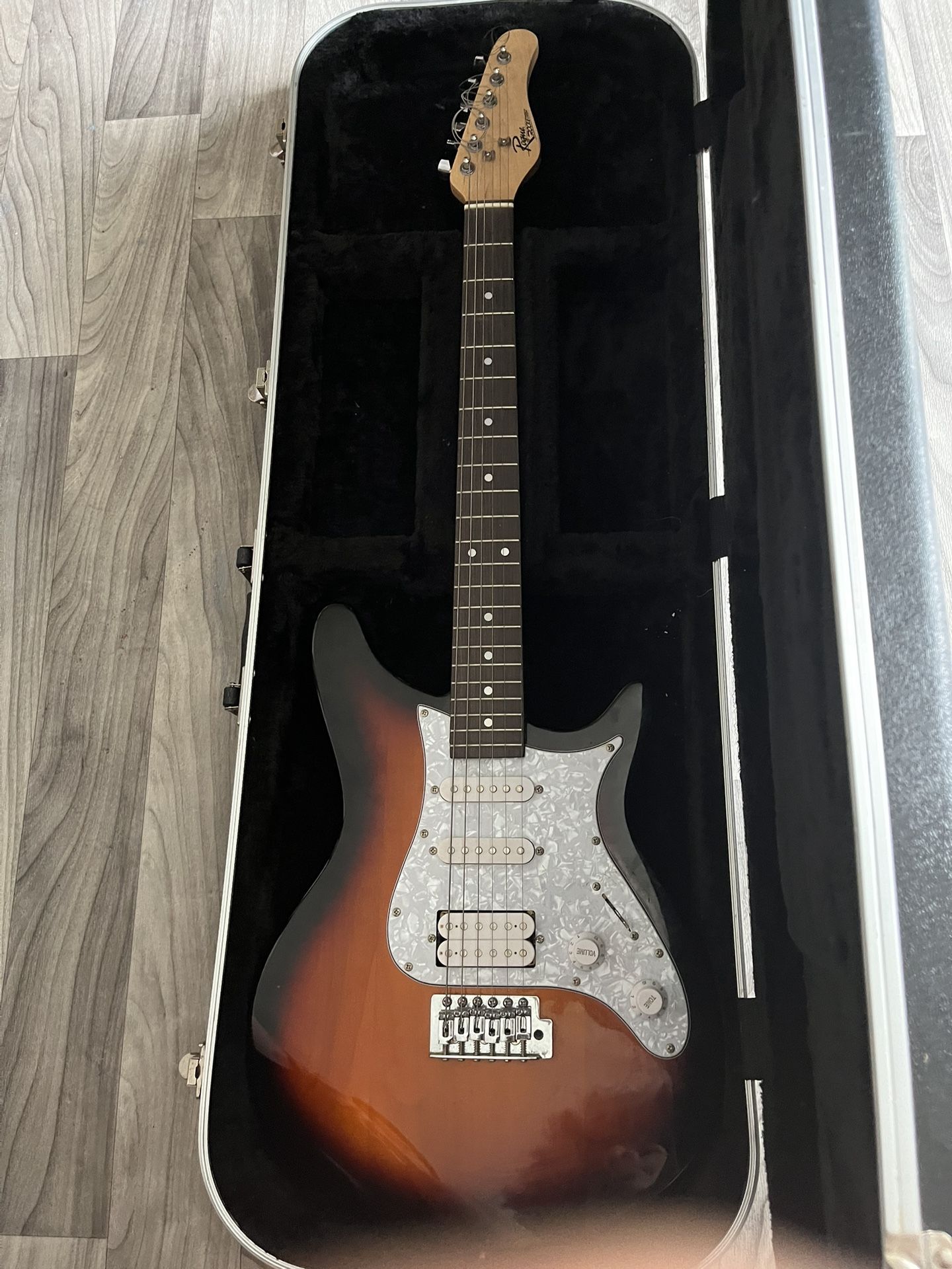 One Electric guitar and case 