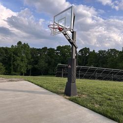 Goalrilla 60 inch in ground basketball hoop, adjustable basketball court 