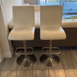 2 White Swivel Barstools 