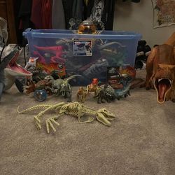 Box Full Of Dinosaurs And Action Figures 