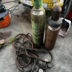 Cutting Torch With Oxygen And Acetylene Tanks