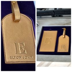 Brand New Elton John Gold Boxed Set Passport Holder & Luggage Set. Mint Condition