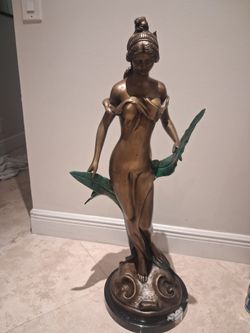Estatua bronze