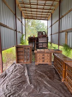 Trailer full of solid wood furniture
