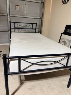 Metal twin bed frame with mattress