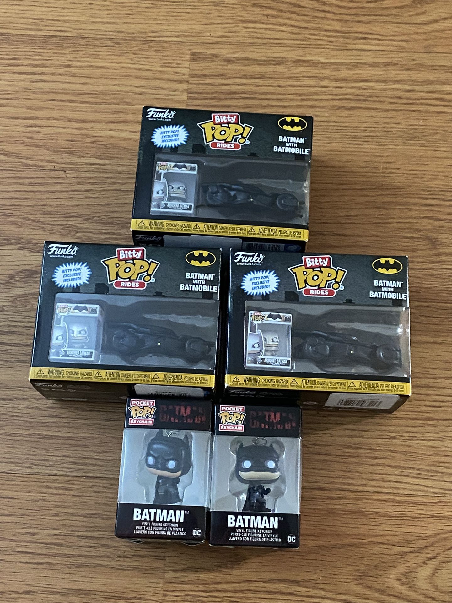 Brand new funko pop mini batman with the batmobile & mini Funko pop Batman key chain’s $ 20 each