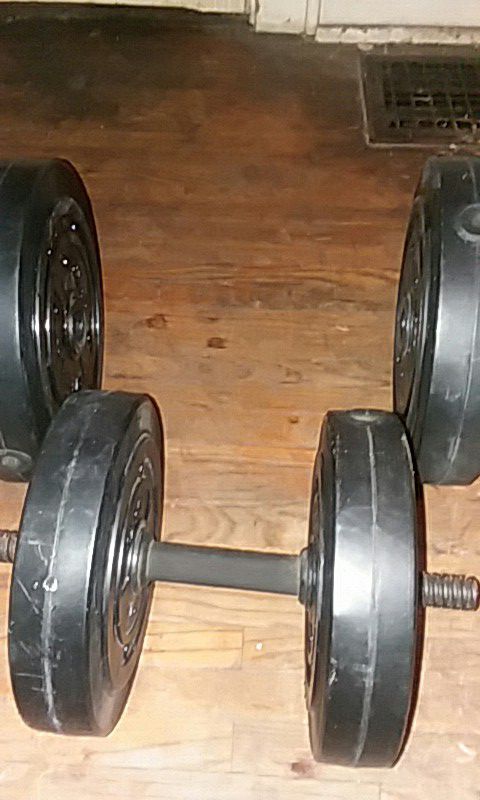 Legacy dumbell set 2 10 pound sand weights and 2 15 pound sand weights