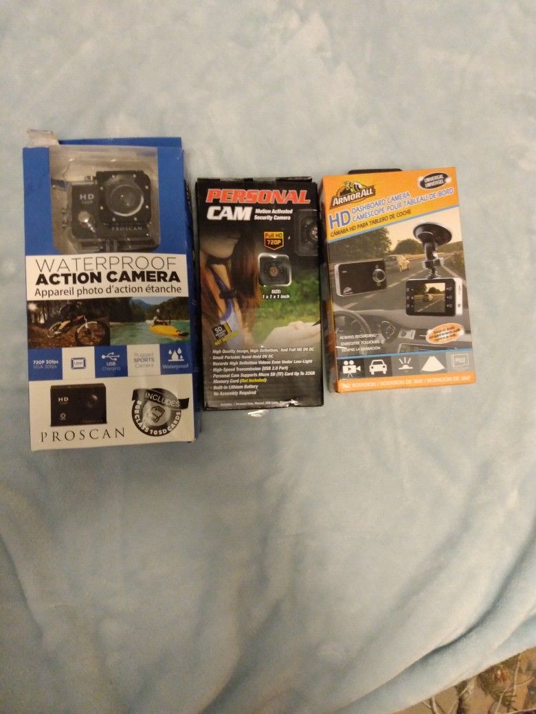 A Waterproof Action Camera Personal Camera And A Dashboard Camera