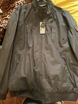 Men’s water proof rain jacket brand new