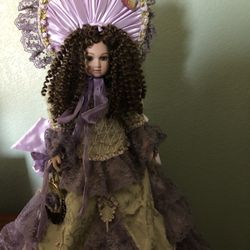 Porcelain Doll on Stand