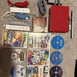 Nintendo Wii + 10 games (hablo espanol)