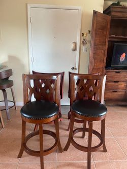 Set of 4 Solid Wood Swivel Bar Stools with Genuine Leather Seats