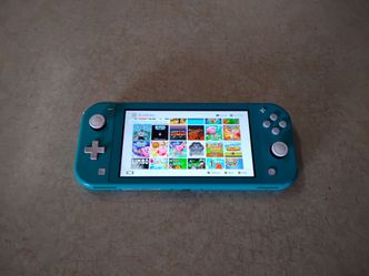 NINTENDO SWITCH LITE MOD with 55 SWITCH GAMES