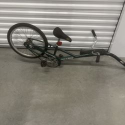 Tag a long bike.  Used in good condition with minor cosmetic blemishes. These blemishes are in the form of minor scratches and scuff marks associated 