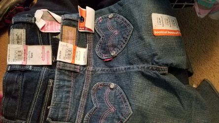 NEW 2 pair Levi's size 5 Slim Bootcut and Flare new