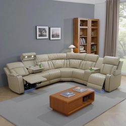 Beige power reclining couch
