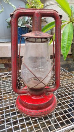 An antique Paull's No. 0 Kerosene Lantern