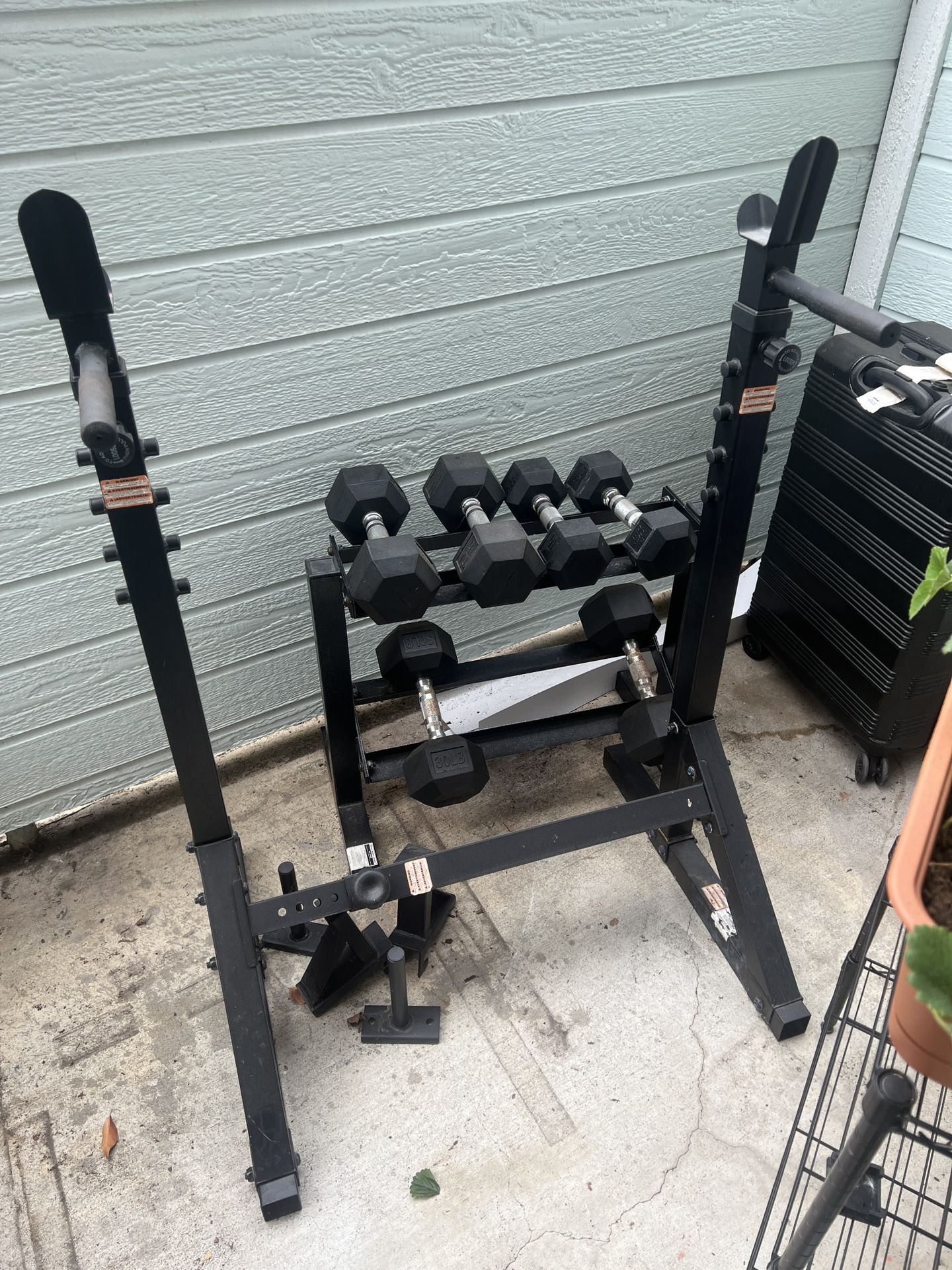 Squat rack, Dumbbells, and Stand