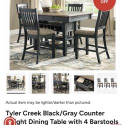 Tyler Creek Dinning Table Along With Six Chairs