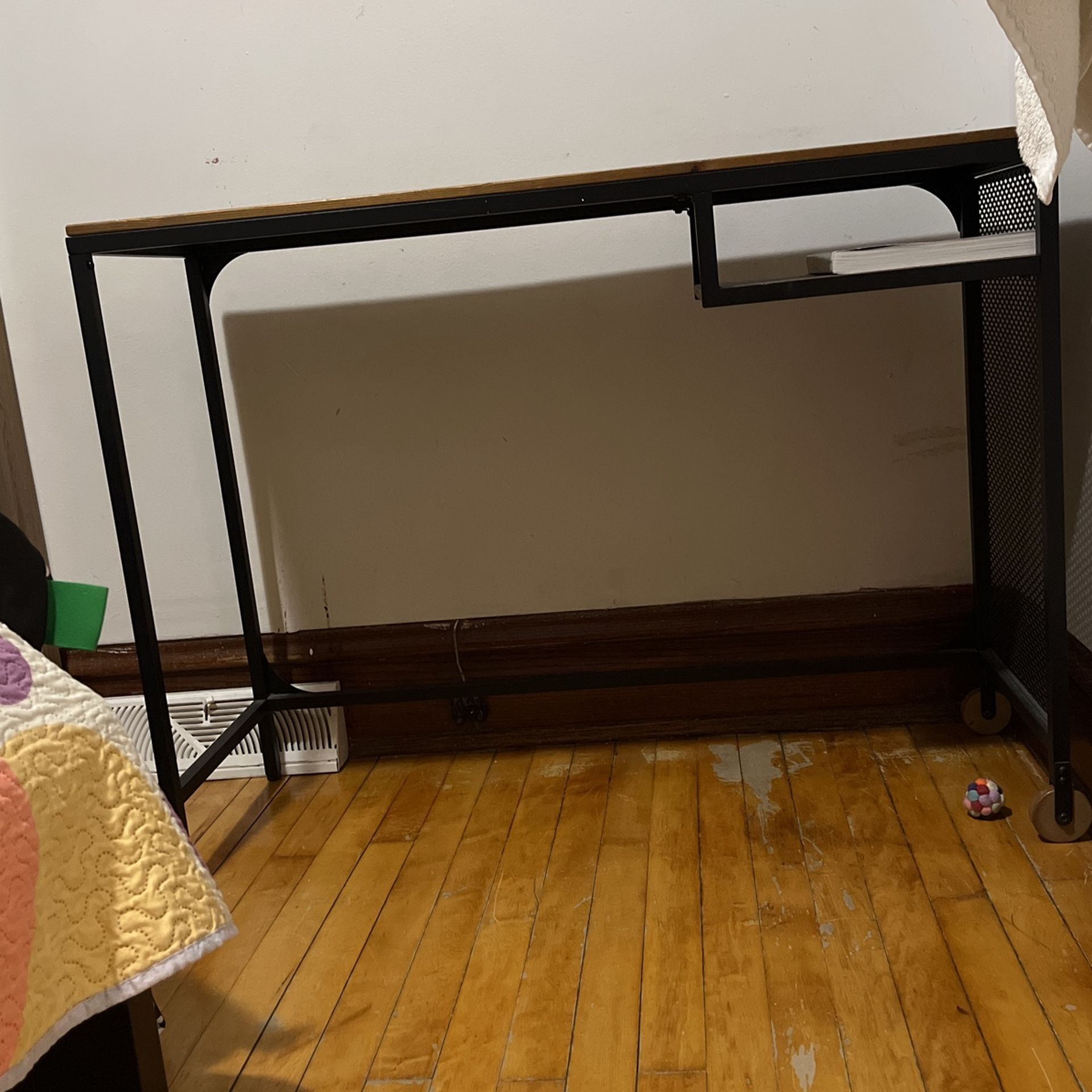 Desk With Wheels And Small Compartment