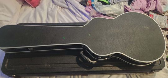 TONS OF GUITAR CASES