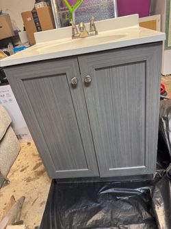 Sink vanity and faucet