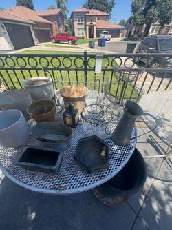 Pots with iron stand and extras all for $50 or will sell separately