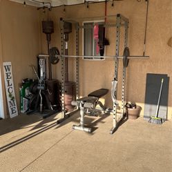 Squat Racks With Weights And Curl Bars