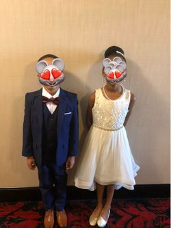 Kid ring bearer’s suit and flower girl dress
