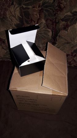 Box of 100 black gift boxes. $25