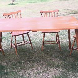 vintage wood  dining table and 4 chaiirs 