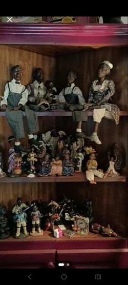 Collection of African dolls and figures