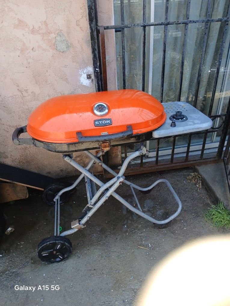 2 BBQ GRILS ORANGE ONE $30 OR BEST OFFER BLACK SMALL ONE $13 OR BEST OFFER BBQ TIME BOTH USE CHOARCAL ONLY