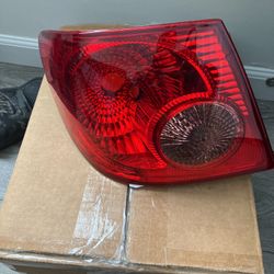 Left Rear Outer Tail Light Assembly 