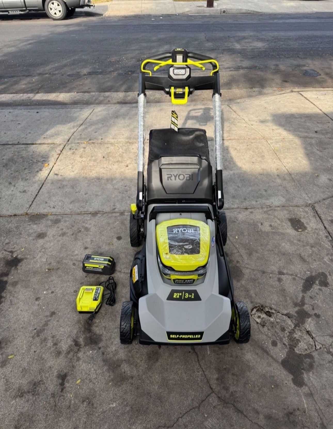 RYOBI 40V HP Brushless 21 in. Cordless Battery Walk Behind Self-Propelled Lawn Mower with (1) 6.0 Ah Batteries and Charger