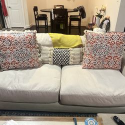 Comfortable Beige Sofa with Decorative Pillows
