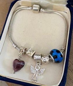 Pulseras Stainless Cordon CON Dijes Cada Una