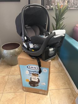 New Graco SnugRide SnugFit LX Infant Car Seat, Pierce Extra Rear-Facing Safety with Anti-Rebound Bar