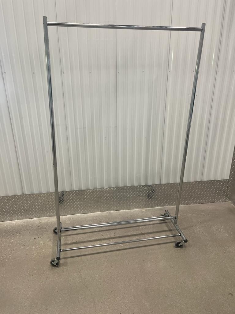 Metal clothing/wardrobe rack on wheels.