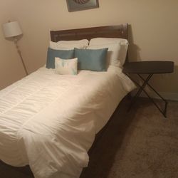 Full size bed with frame, box spring and mattress only.